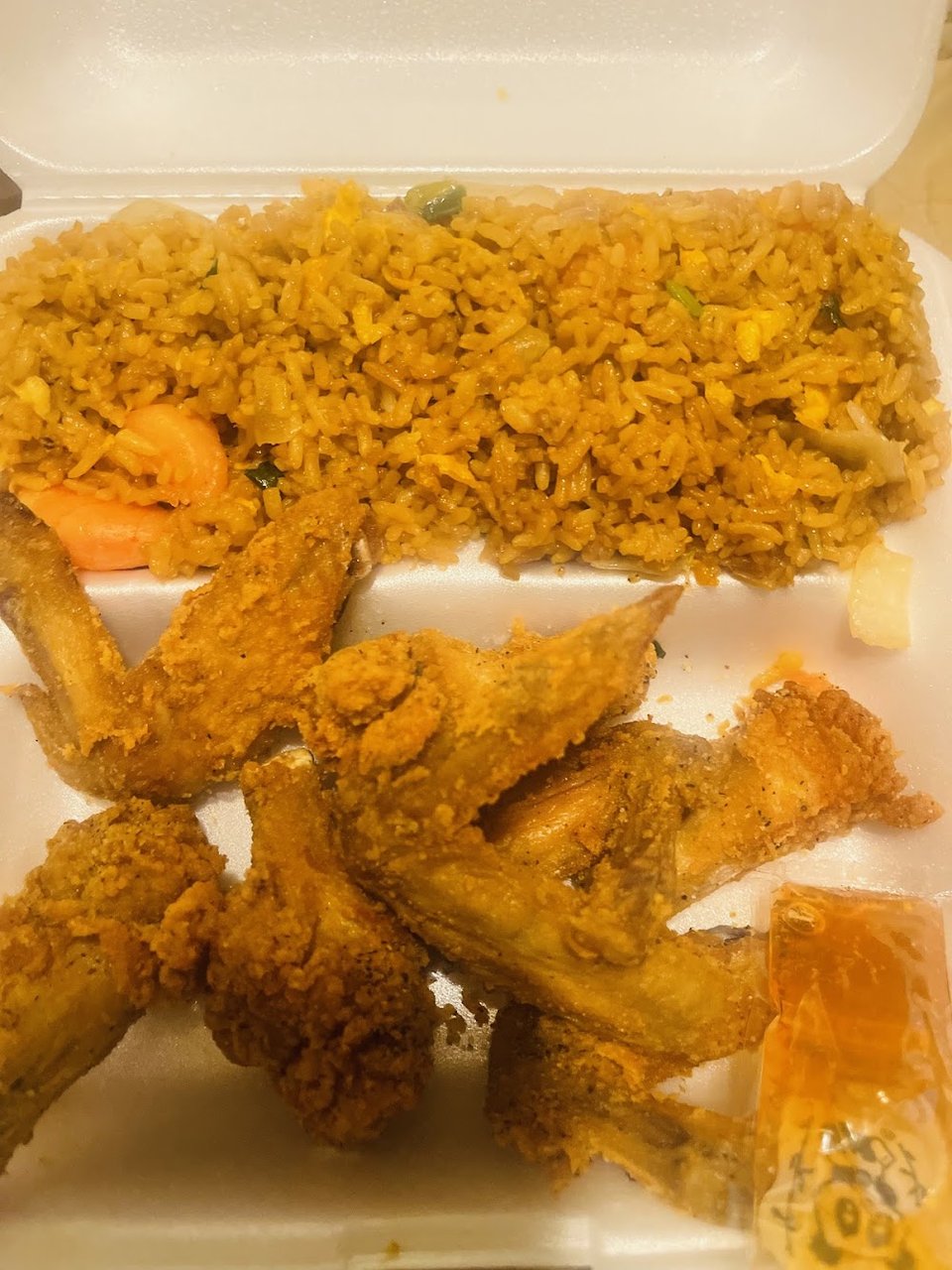 Printed menu showing salads and fried chicken.